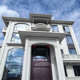 上海白麻别墅外墙干挂石材效果示例